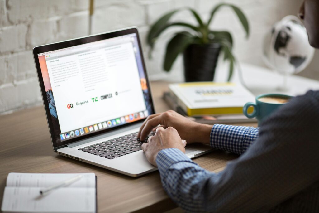 Employee checking email that's protected by business email security software.